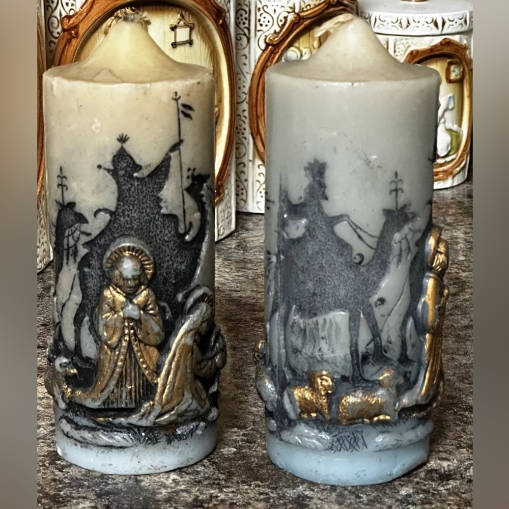 Vintage Christmas adoration, candles, nativity scene.